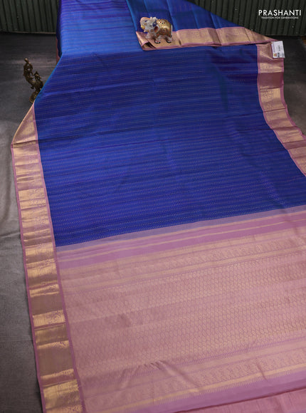 Pure kanchipuram silk saree blue and pastel pink with allover zari weaves and zari woven korvai border