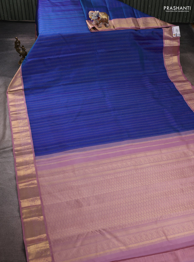 Pure kanchipuram silk saree blue and pastel pink with allover zari weaves and zari woven korvai border