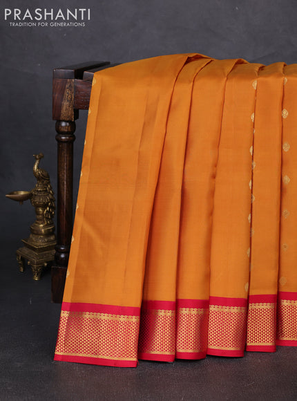 Pure kanchipuram silk saree dark mustard and reddish pink with zari woven buttas and zari woven korvai border