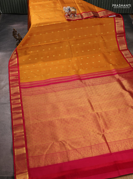 Pure kanchipuram silk saree dark mustard and reddish pink with zari woven buttas and zari woven korvai border