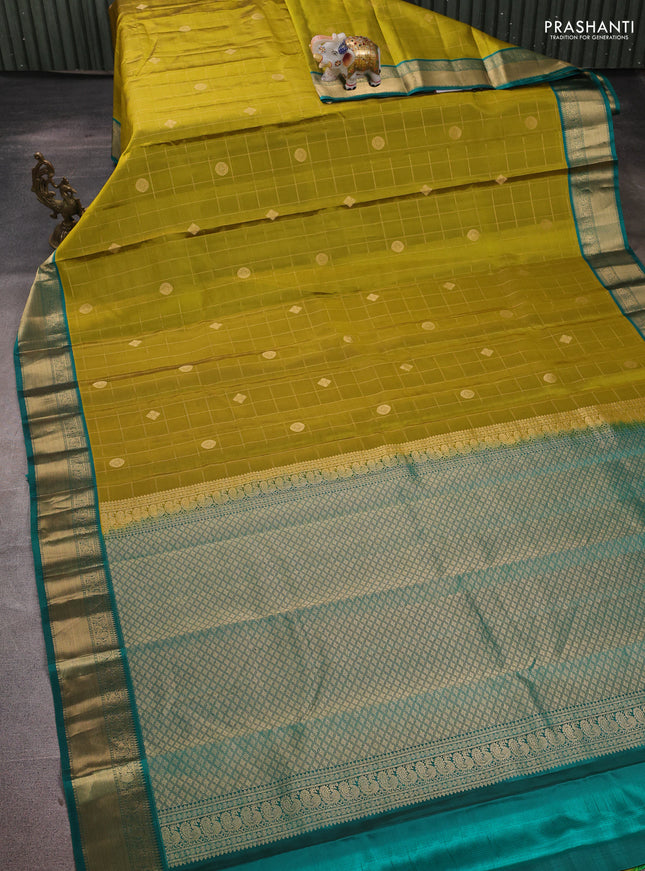Pure kanchipuram silk saree mehendi green and peacock green with allover zari checks & buttas and zari woven border