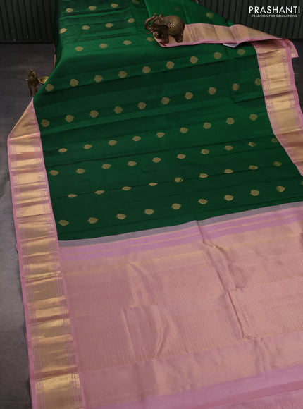 Pure kanchipuram silk saree green and light pink with zari woven buttas and zari woven korvai border