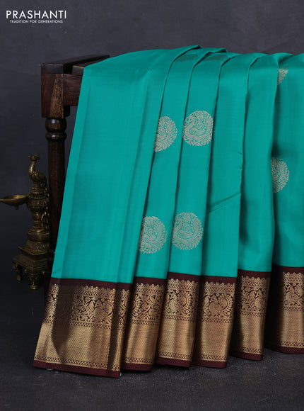 Pure kanchipuram silk saree teal blue and coffee brown with zari woven buttas and zari woven korvai border