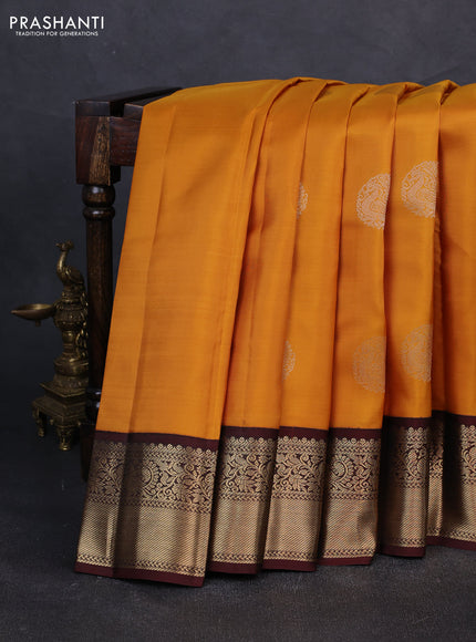 Pure kanchipuram silk saree mustard yellow and deep maroon with zari woven buttas and zari woven korvai border