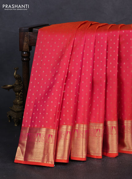 Pure kanchipuram silk saree dual shade of pinkish orange with allover zari woven 1000 buttas and zari woven border