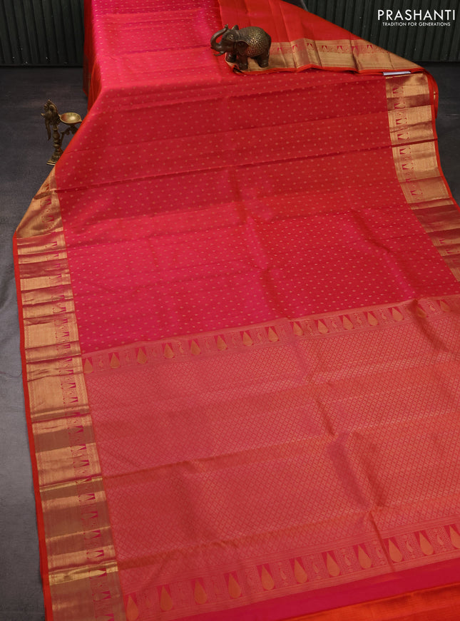 Pure kanchipuram silk saree dual shade of pinkish orange with allover zari woven 1000 buttas and zari woven border