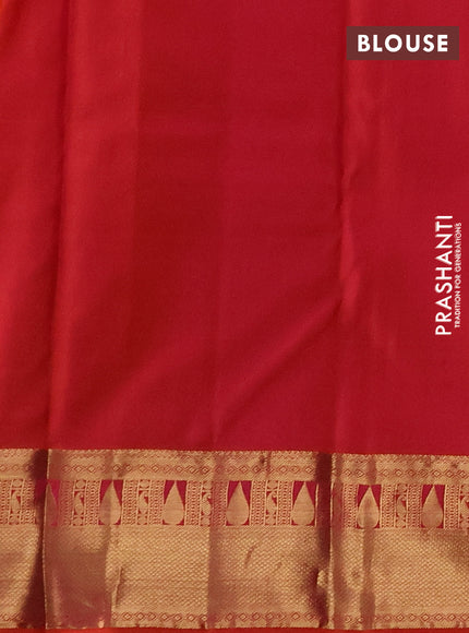Pure kanchipuram silk saree dual shade of pinkish orange with allover zari woven 1000 buttas and zari woven border
