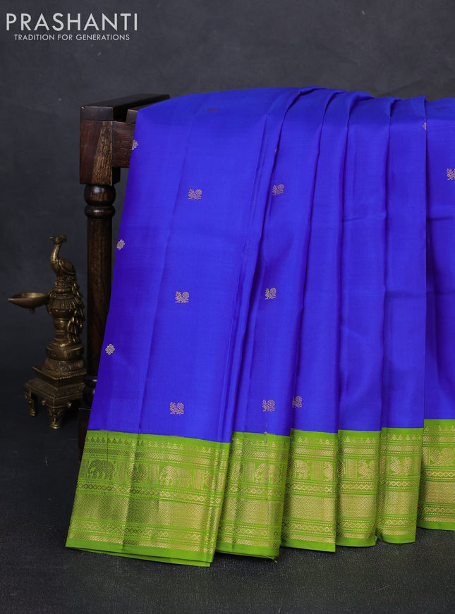 Pure kanchipuram silk saree royal blue and light green with zari woven buttas and zari woven korvai border