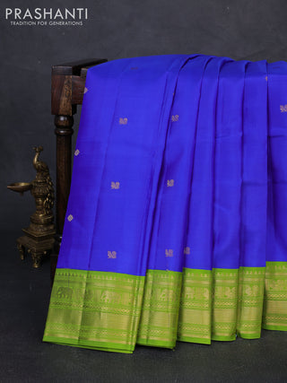 Pure kanchipuram silk saree royal blue and light green with zari woven buttas and zari woven korvai border