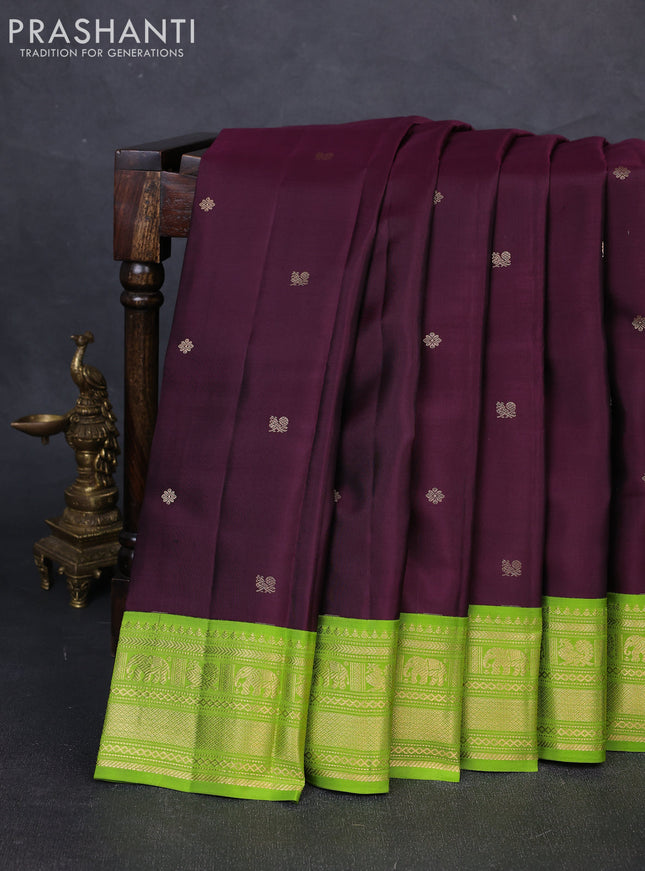 Pure kanchipuram silk saree deep wine and light green with zari woven buttas and zari woven korvai border