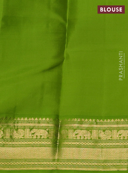 Pure kanchipuram silk saree deep wine and light green with zari woven buttas and zari woven korvai border
