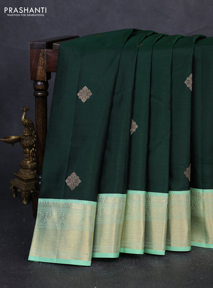 Pure kanchipuram silk saree drak green and teal green with zari woven buttas and zari woven korvai border