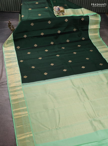 Pure kanchipuram silk saree drak green and teal green with zari woven buttas and zari woven korvai border