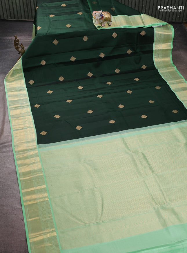 Pure kanchipuram silk saree drak green and teal green with zari woven buttas and zari woven korvai border