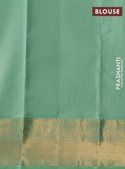 Pure kanchipuram silk saree deep jamun and pista green with zari woven buttas and zari woven korvai border