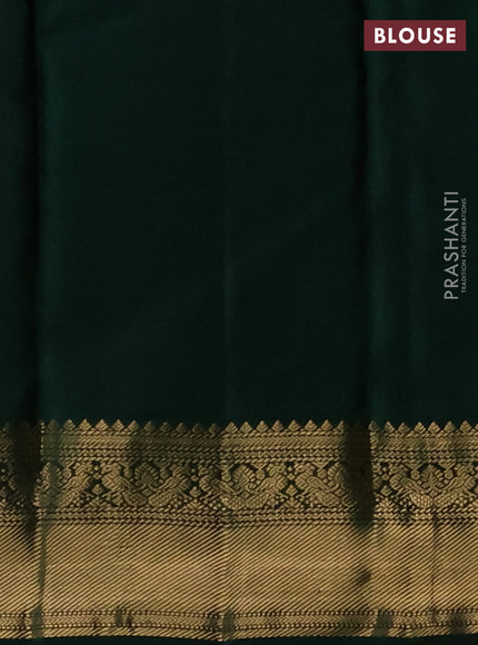 Pure kanchipuram silk saree sandal and dark green with zari woven buttas and zari woven korvai border