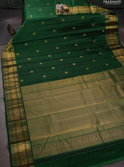 Pure kanchipuram silk saree green with allover zari weaves & buttas and zari woven border