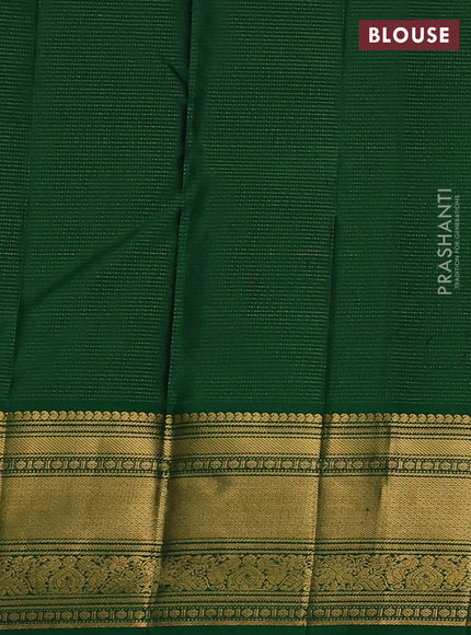 Pure kanchipuram silk saree green with allover zari weaves & buttas and zari woven border