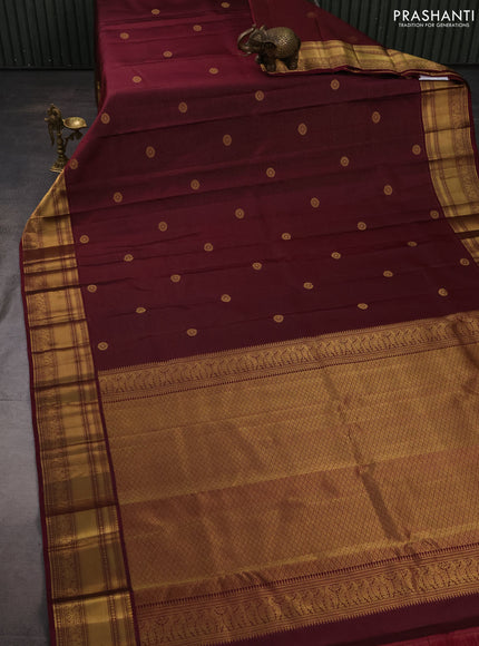 Pure kanchipuram silk saree deep wine with allover zari weaves & buttas and zari woven border
