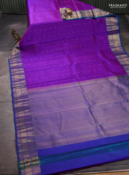 Pure kanchipuram silk saree purple and cs blue with allover zari woven buttas and zari woven border