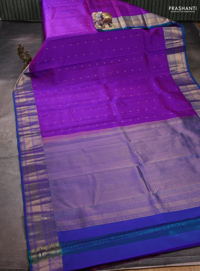Pure kanchipuram silk saree purple and cs blue with allover zari woven buttas and zari woven border