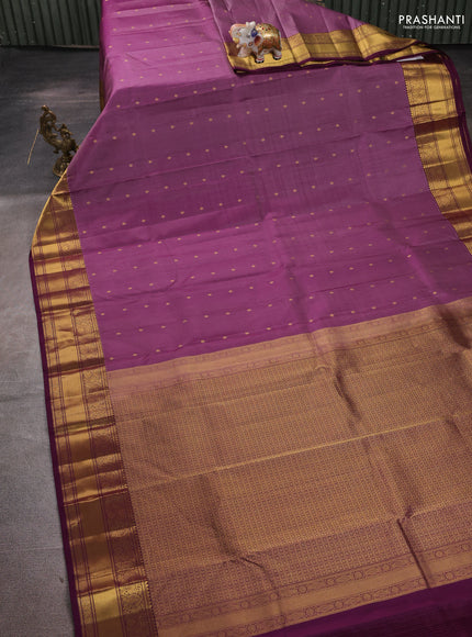 Pure kanchipuram silk saree mauve pink and wine shade with zari woven buttas and zari woven border