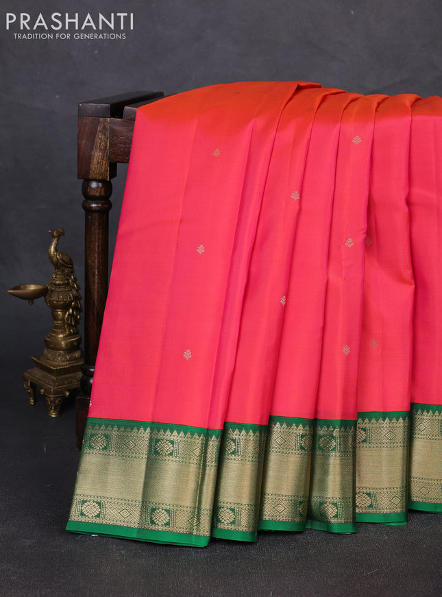 Pure kanchipuram silk saree dual shade of pinkish orange and green with zari woven buttas and zari woven korvai border