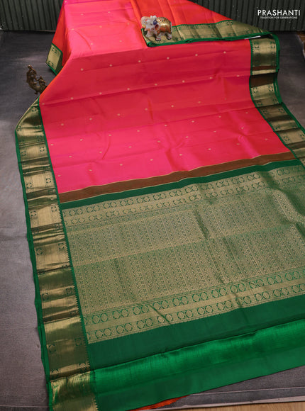 Pure kanchipuram silk saree dual shade of pinkish orange and green with zari woven buttas and zari woven korvai border