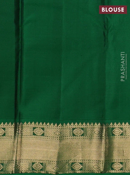 Pure kanchipuram silk saree dual shade of pinkish orange and green with zari woven buttas and zari woven korvai border