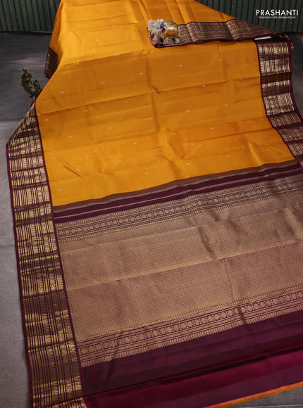 Pure kanchipuram silk saree mustard yellow and wine shade with zari woven buttas and zari woven korvai border