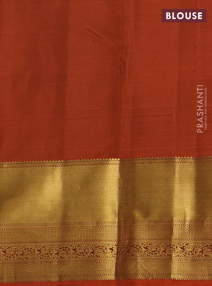 Pure kanchipuram silk saree green and rustic orange with zari woven buttas and rich zari woven border