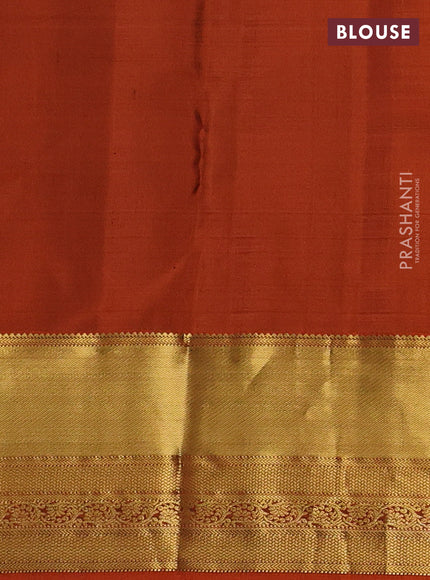 Pure kanchipuram silk saree deep purple and rustic orange with zari woven buttas and rich zari woven border