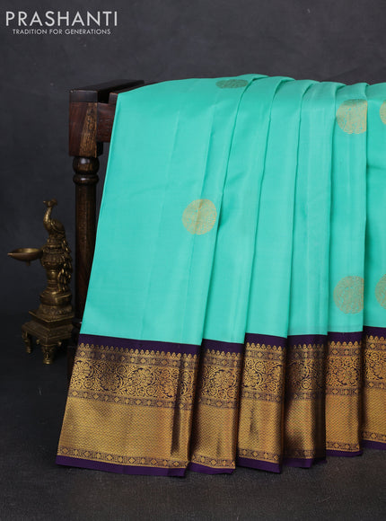 Pure kanchipuram silk saree teal green shade and violet with zari woven buttas and rich zari woven korvai border