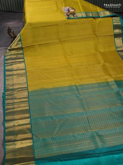 Pure kanchipuram silk saree lime green and teal green with allover zari woven small checked pattern and long zari woven border