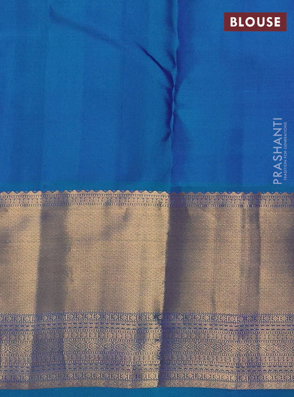 Pure kanchipuram silk saree blue and dual shade of teal green with allover zari woven small checked pattern and long zari woven border