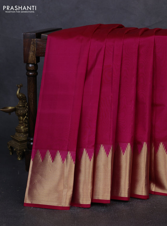 Pure kanchipuram silk saree pink with plain body and temple design zari woven border