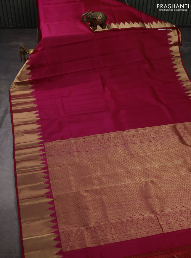 Pure kanchipuram silk saree pink with plain body and temple design zari woven border