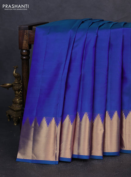Pure kanchipuram silk saree blue with plain body and temple design zari woven border