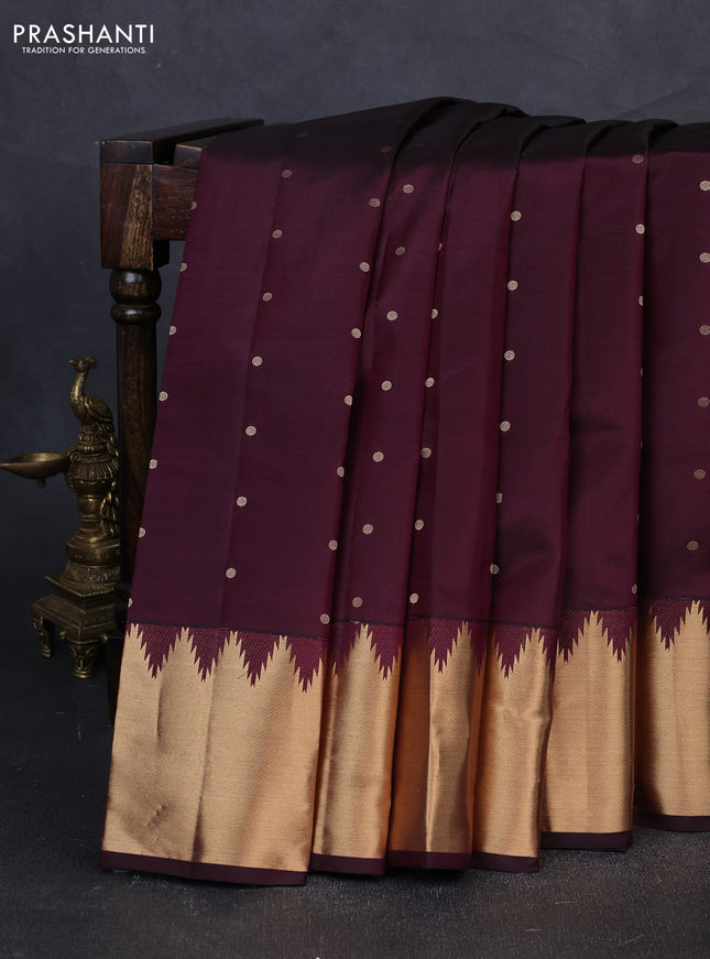 Pure kanchipuram silk saree deep wine shade with zari woven buttas and temple design zari woven border