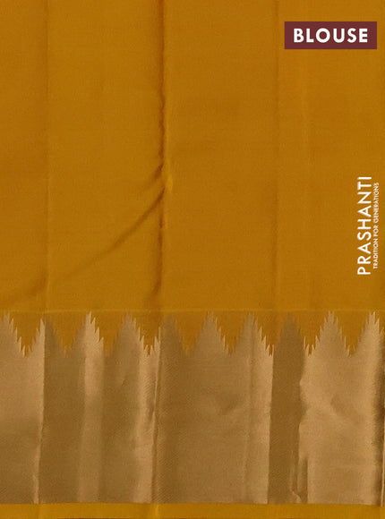 Pure kanchipuram silk saree mustard yellow with zari woven buttas and temple design zari woven border
