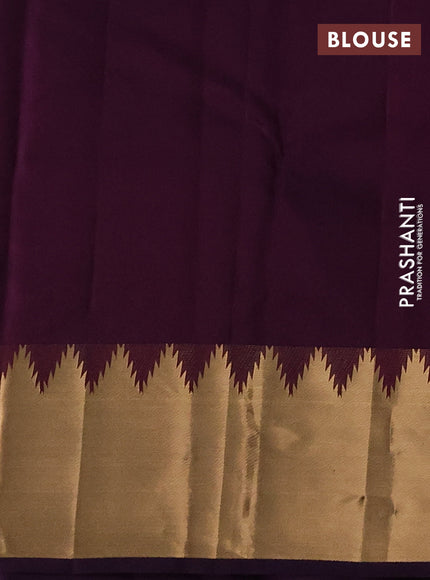 Pure kanchipuram silk saree deep violet with zari woven buttas and temple design zari woven border