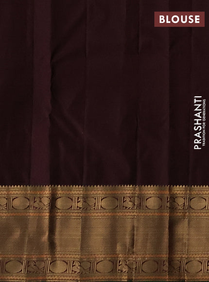 Pure kanchipuram silk saree dual shade of pinkish orange and coffee brown with allover zari checked pattern and zari woven korvai border