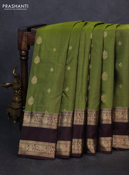 Pure kanchipuram silk saree mehendi green and deep coffee brown with zari woven buttas and rettapet zari woven border