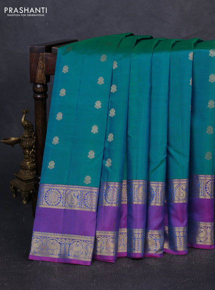 Pure kanchipuram silk saree teal blue and purple with zari woven buttas and rettapet zari woven border