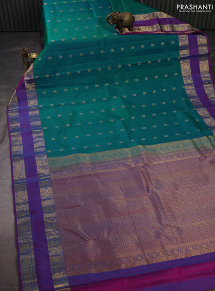 Pure kanchipuram silk saree teal blue and purple with zari woven buttas and rettapet zari woven border