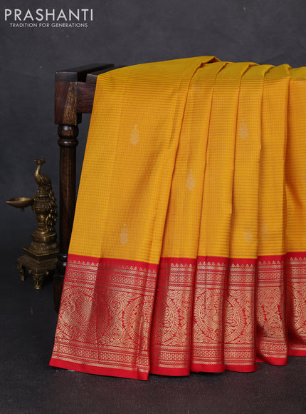 Pure kanchipuram silk saree mustard yellow and red with allover zari strips & buttas and rich zari woven korvai border