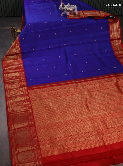 Pure kanchipuram silk saree blue and red with zari woven buttas and long rich zari woven korvai border