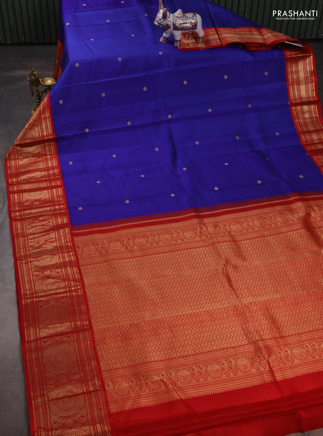 Pure kanchipuram silk saree blue and red with zari woven buttas and long rich zari woven korvai border