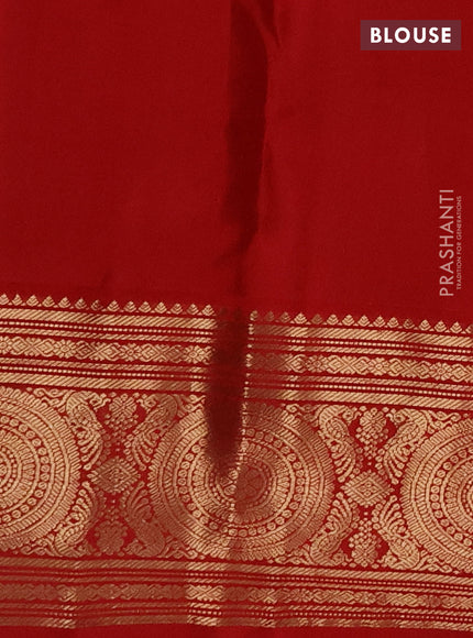Pure kanchipuram silk saree green and red with zari woven buttas and long rich zari woven korvai border