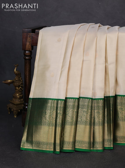 Pure kanchipuram silk saree cream and green with zari woven buttas and long rich zari woven korvai border